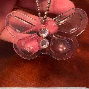 Brand new and rare Coach authentic butterfly hang fob for handbag. So cute